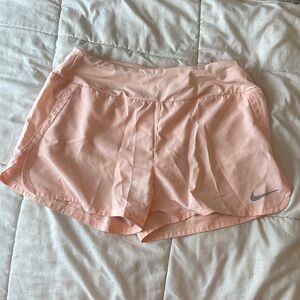 Pink nike running shorts